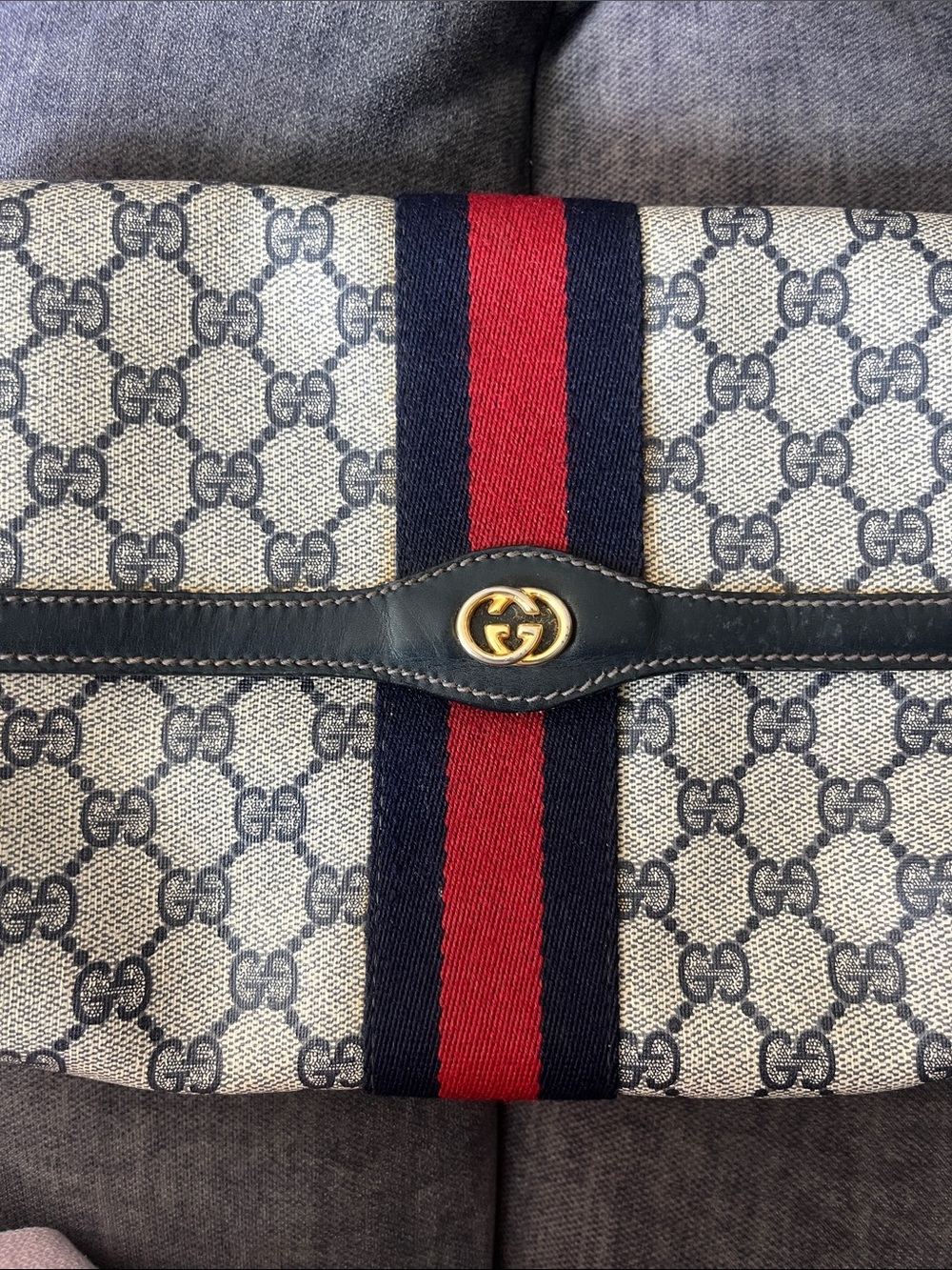 Set of 4 vintage Gucci clutches featuring the signature navy and red Web stripe. - Picture 2 of 13